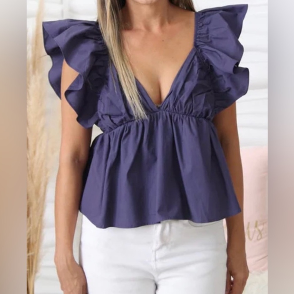 Blue Sleeveless Ruffled Blouse with Cut Out Design